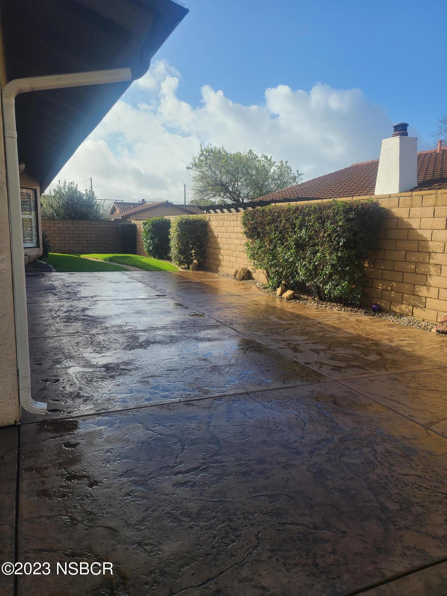 1205 North B Street Lompoc, CA 93436 - Photo 32 of 39 a view of a lake with a big yard