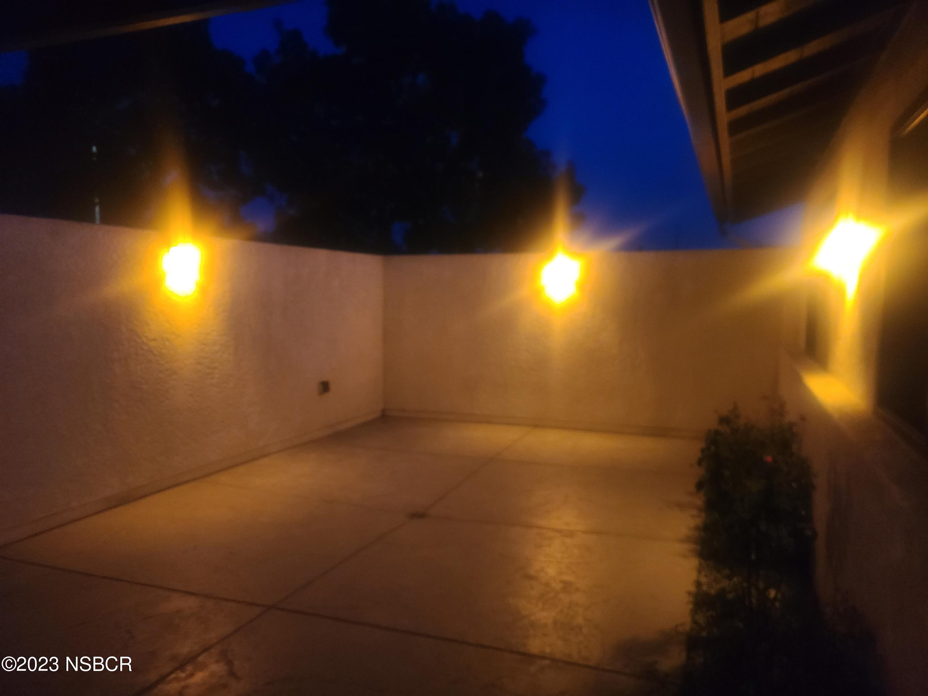 1205 North B Street Lompoc, CA 93436 - Photo 5 of 39 a view of an empty room with a window