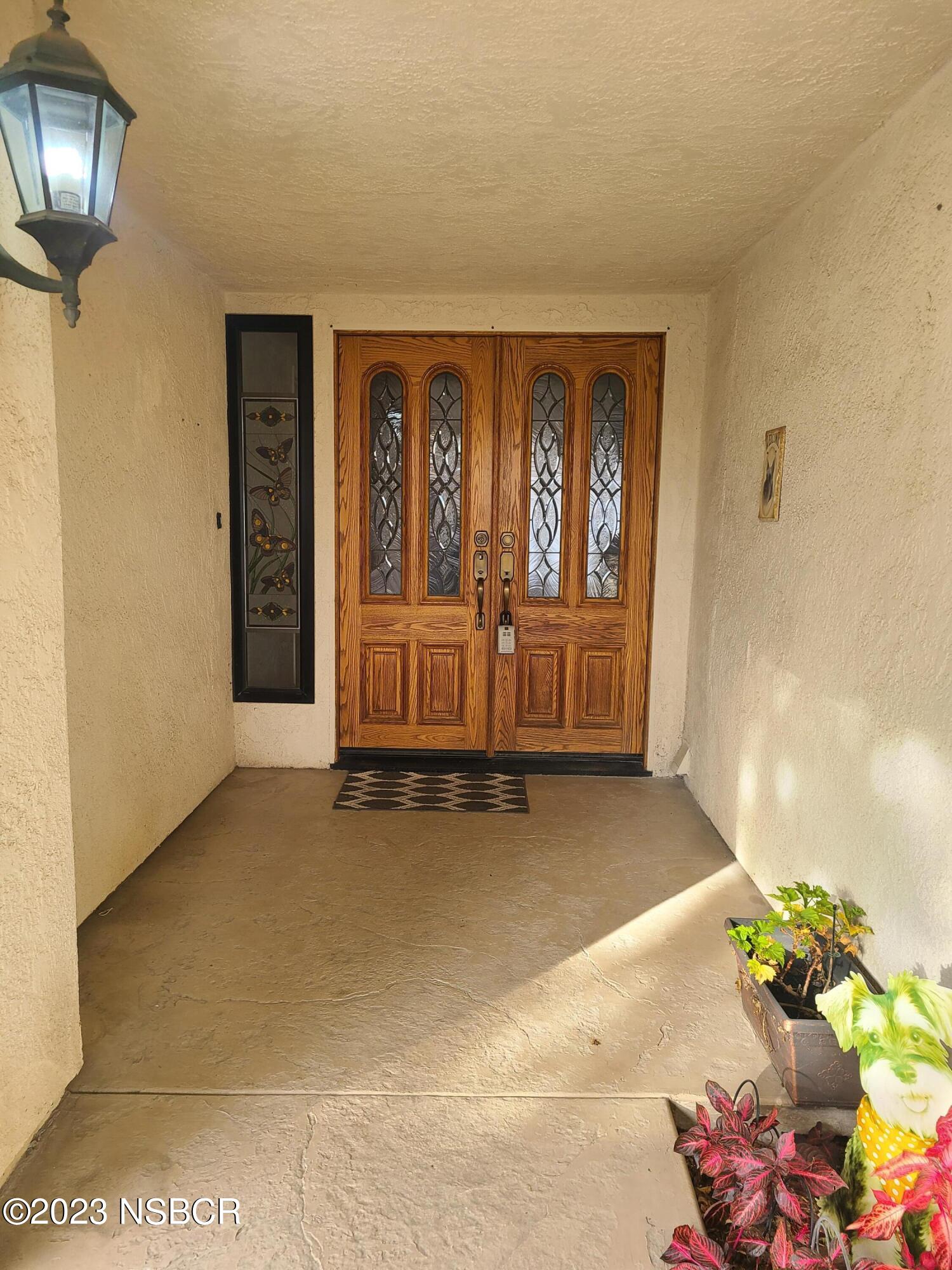 1205 North B Street Lompoc, CA 93436 - Photo 7 of 39 a view of an front door