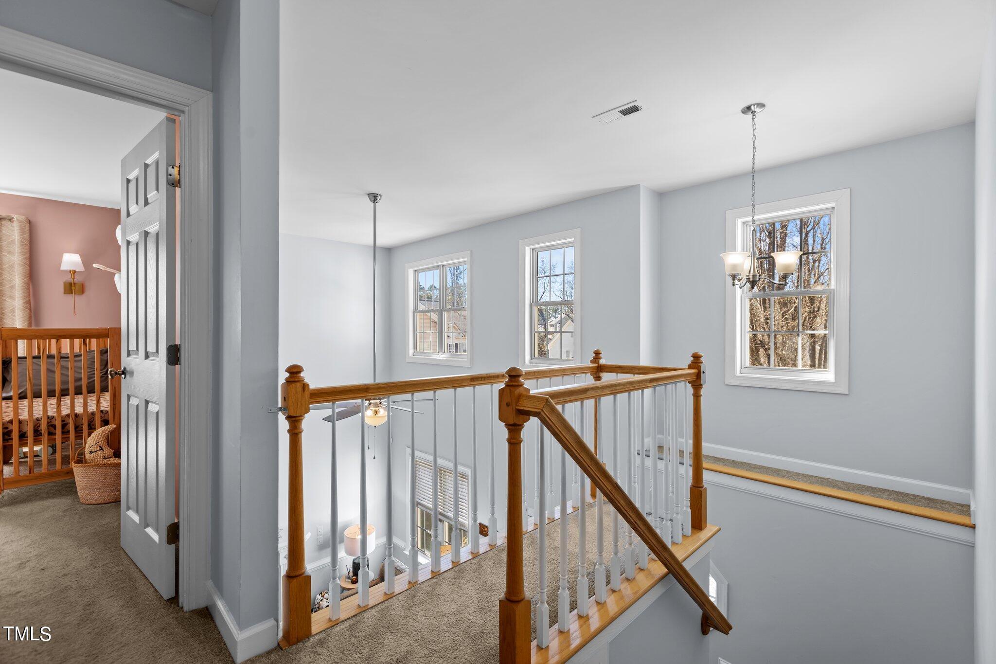 3315 Heygill Lane Raleigh, NC 27604 - Photo 18 of 41 a view of an entryway with window and hallway