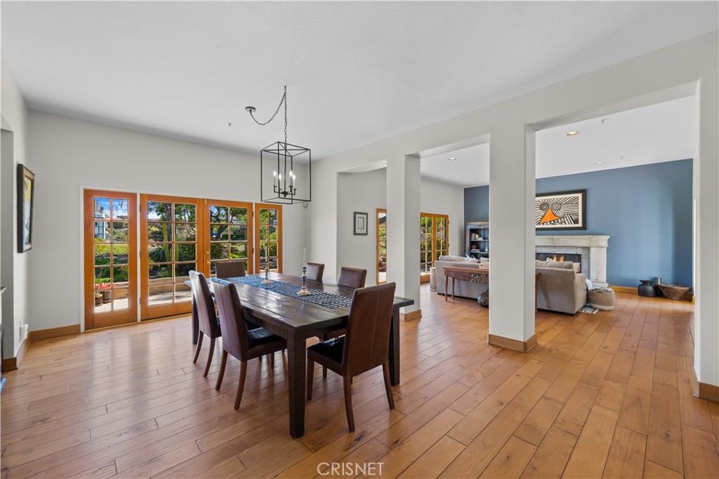 121 Saddlebow Road Bell Canyon, CA 91307 - Photo 18 of 62 a view of a dining room with furniture window and wooden floor