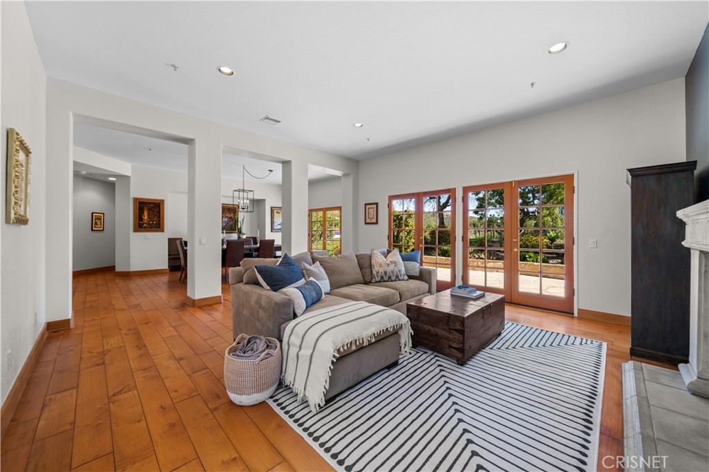 121 Saddlebow Road Bell Canyon, CA 91307 - Photo 22 of 62 a living room with furniture and a flat screen tv