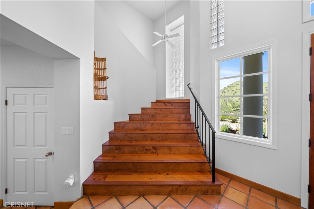 121 Saddlebow Road Bell Canyon, CA 91307 - Photo 26 of 62 a view of entryway with wooden floor and windows