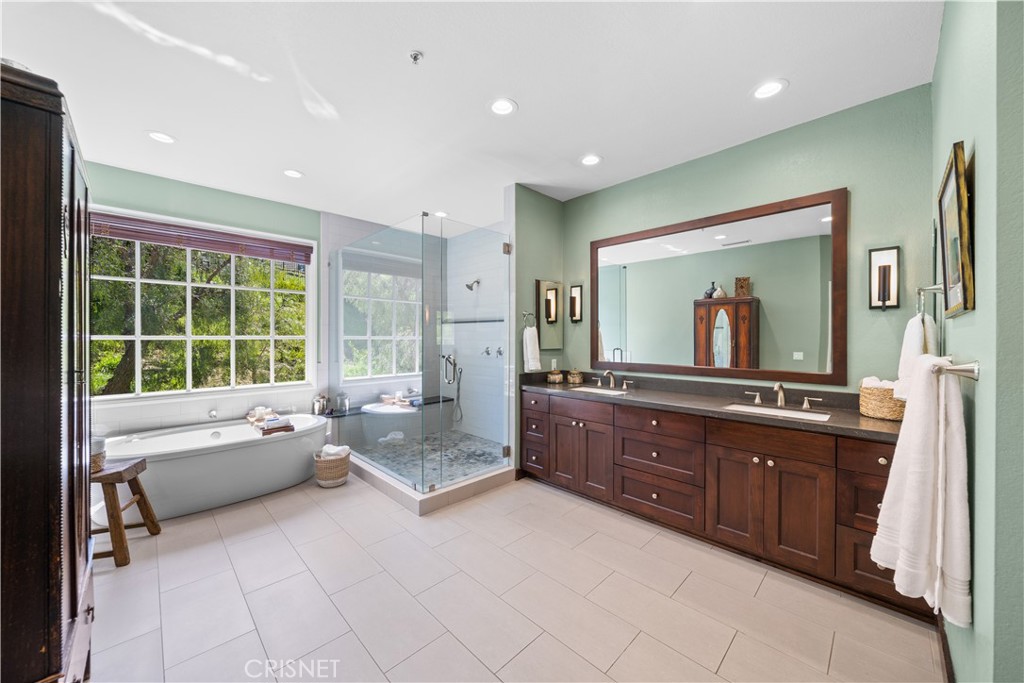121 Saddlebow Road Bell Canyon, CA 91307 - Photo 33 of 62 a large bathroom with a large tub and sink