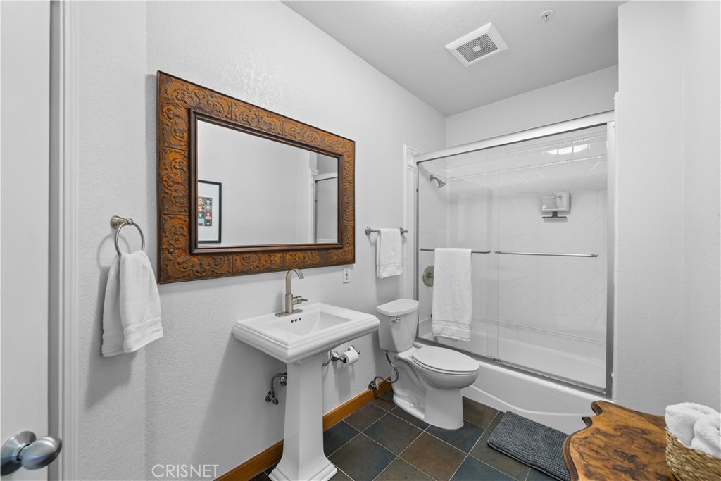 121 Saddlebow Road Bell Canyon, CA 91307 - Photo 37 of 62 a bathroom with a toilet sink and shower