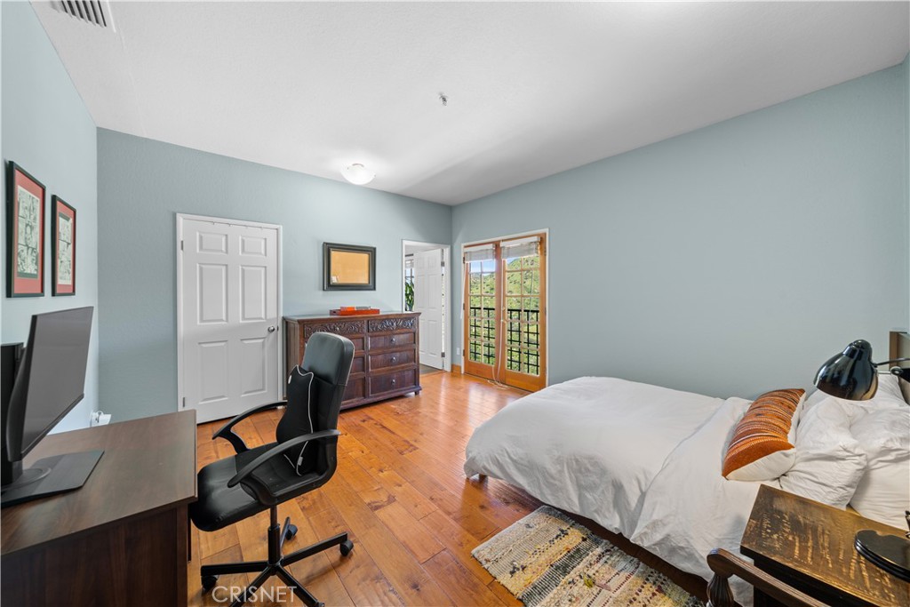 121 Saddlebow Road Bell Canyon, CA 91307 - Photo 38 of 62 a bedroom with a bed a desk and chair