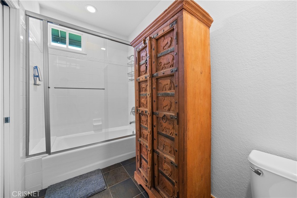121 Saddlebow Road Bell Canyon, CA 91307 - Photo 40 of 62 a bathroom with a shower and toilet