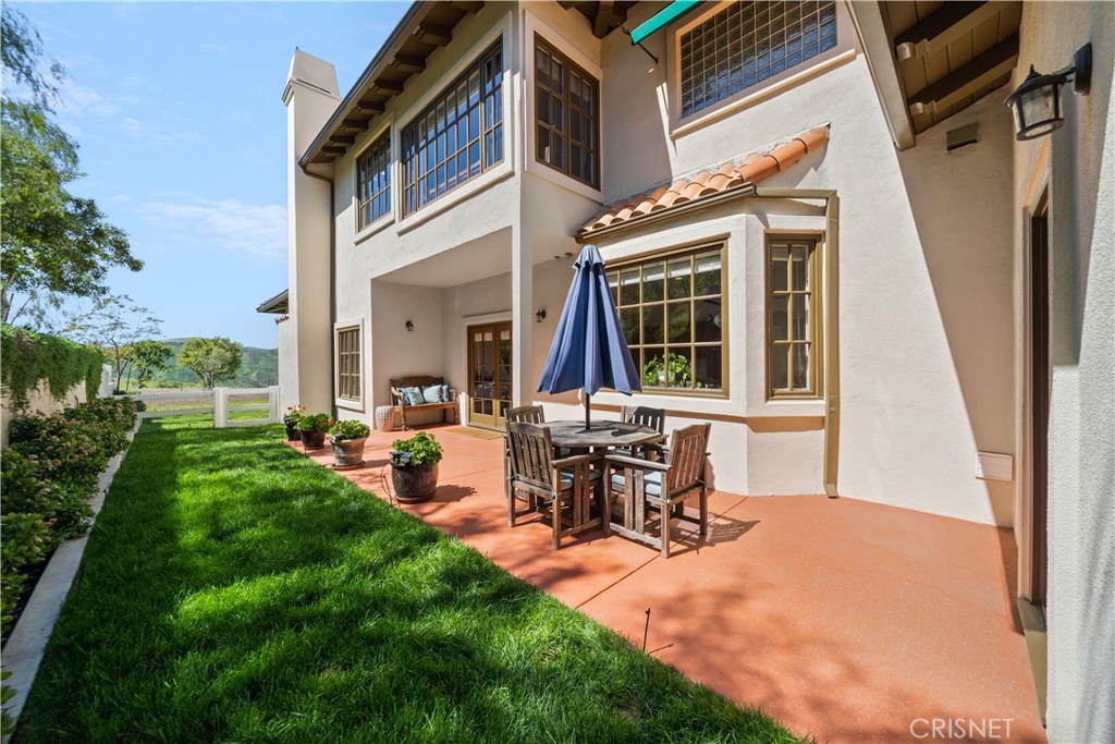 121 Saddlebow Road Bell Canyon, CA 91307 - Photo 44 of 62 a view of a house with backyard porch and sitting area