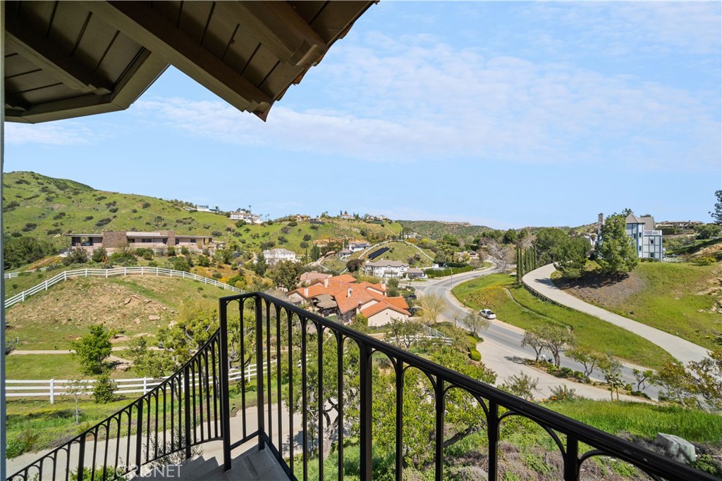 121 Saddlebow Road Bell Canyon, CA 91307 - Photo 46 of 62 a view of a city skyline from a balcony