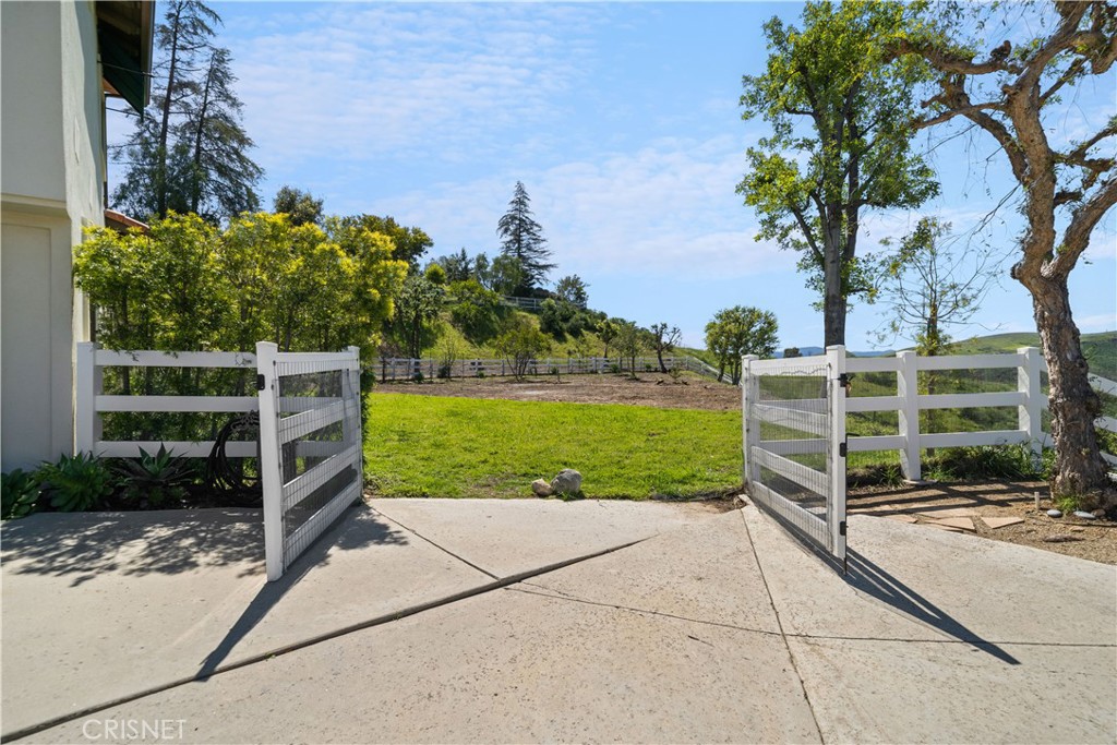 121 Saddlebow Road Bell Canyon, CA 91307 - Photo 47 of 62 a view of a chair and table in the garden