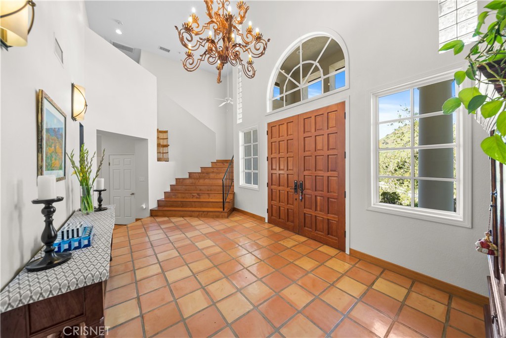 121 Saddlebow Road Bell Canyon, CA 91307 - Photo 5 of 62 a view of entryway with stairs and wooden floor