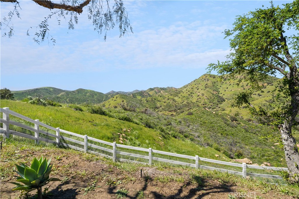 121 Saddlebow Road Bell Canyon, CA 91307 - Photo 52 of 62 a view of a yard with wooden fence
