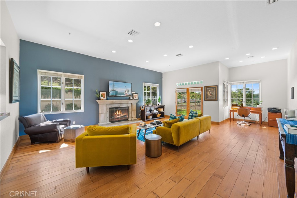 121 Saddlebow Road Bell Canyon, CA 91307 - Photo 7 of 62 a living room with furniture and a flat screen tv