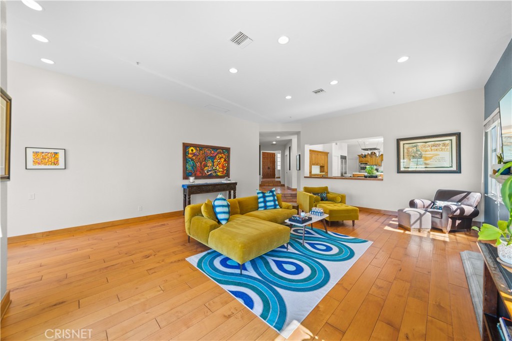 121 Saddlebow Road Bell Canyon, CA 91307 - Photo 9 of 62 a living room with furniture and a wooden floor