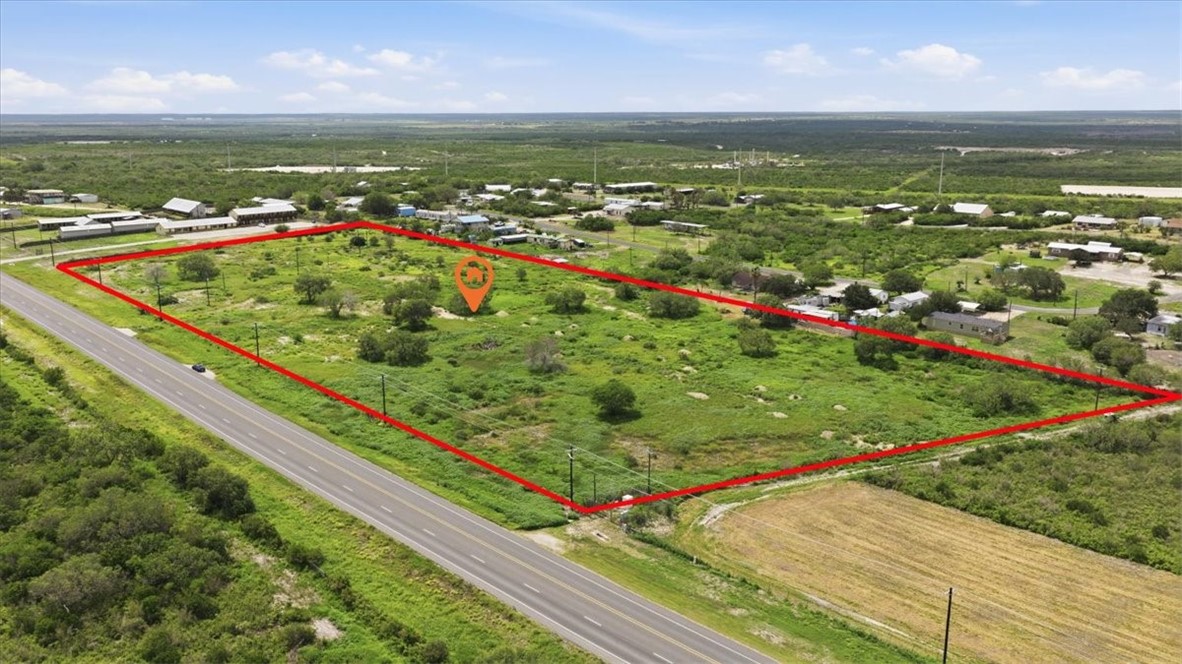 3187 Highway 72 Three Rivers, TX 78071 - Photo 6 of 13 a view of a lake with a big yard