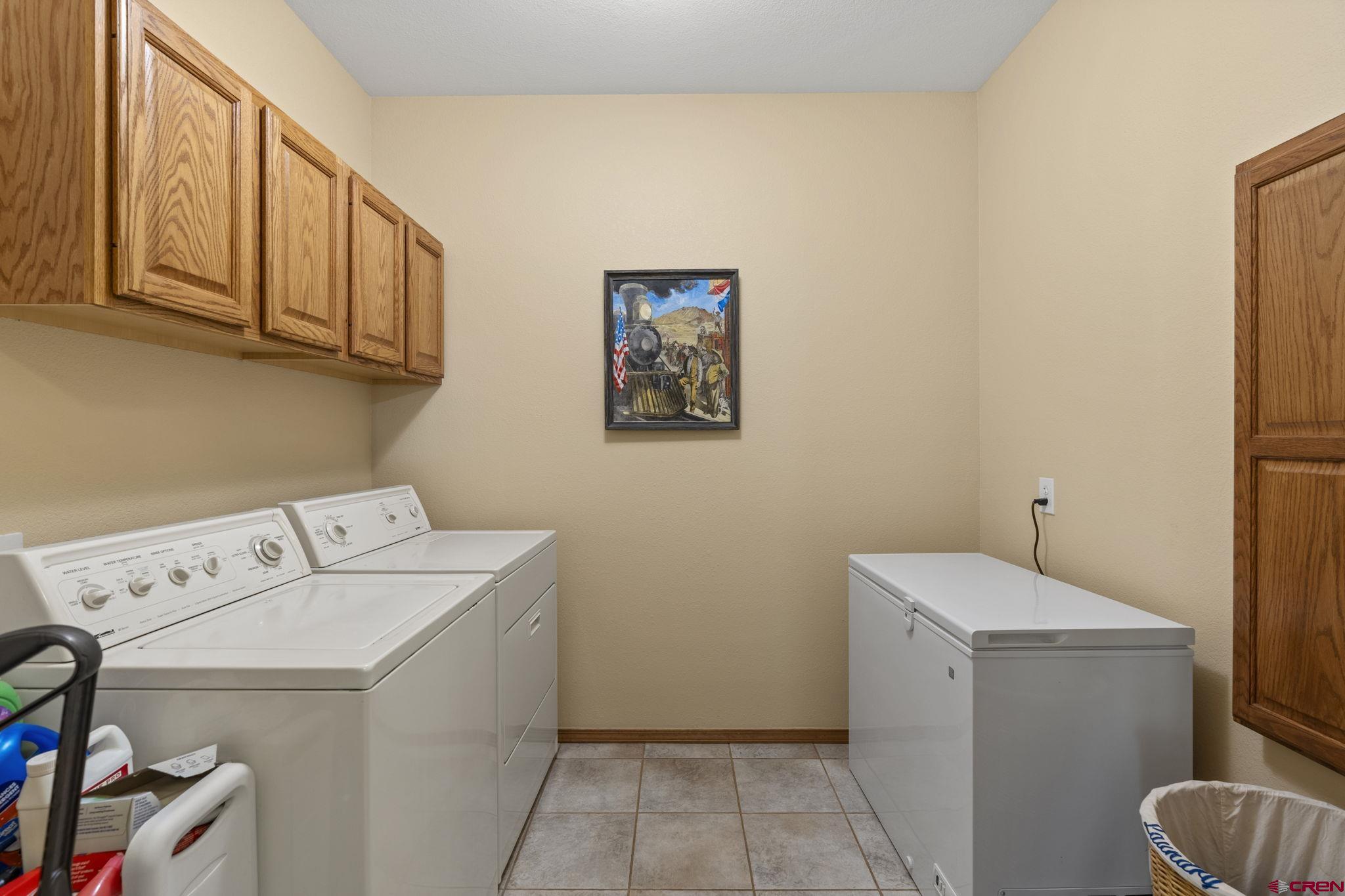 33140 Highway 550 Durango, CO 81301 - Photo 21 of 38 a utility room with dryer and washer