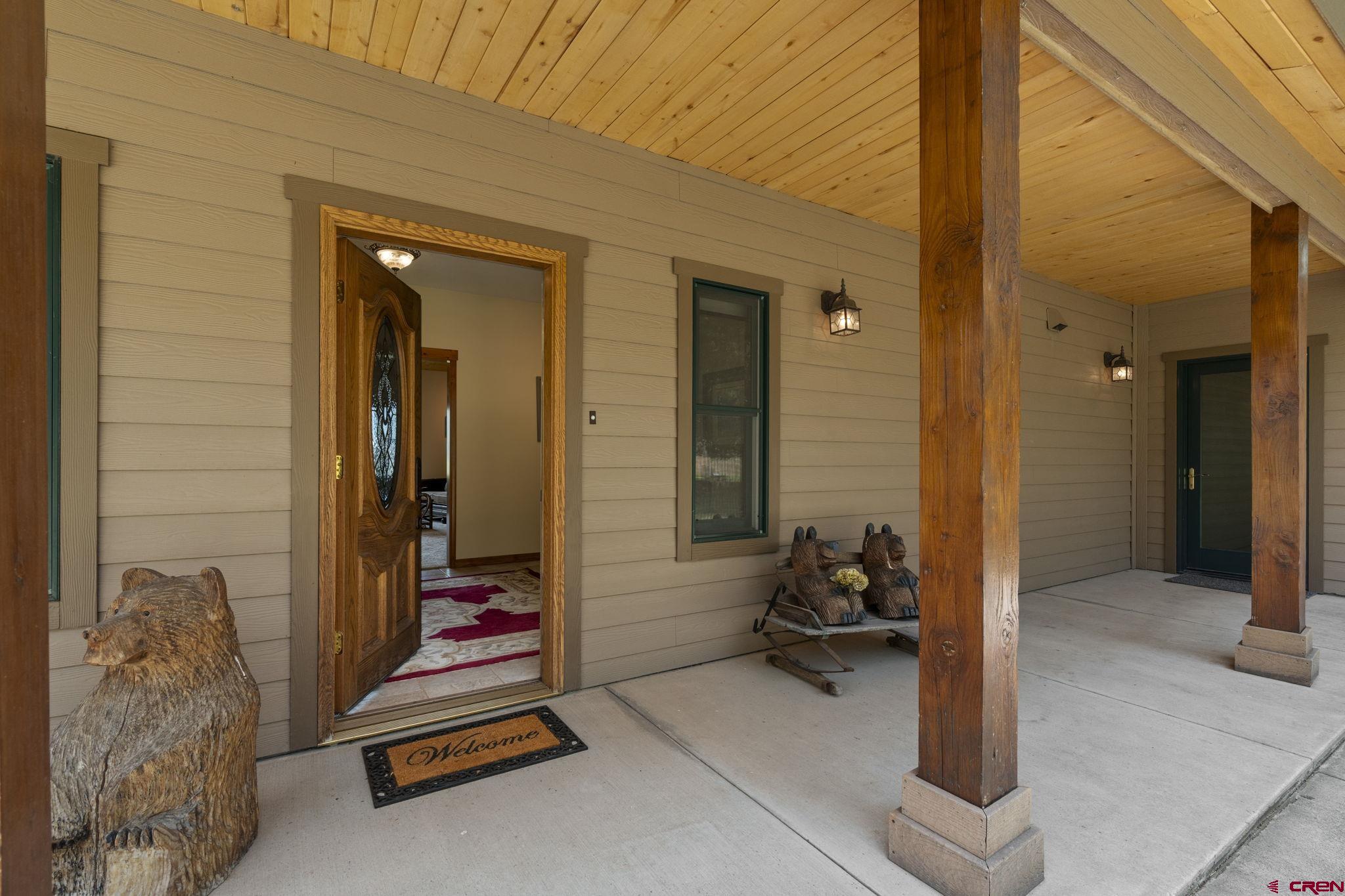 33140 Highway 550 Durango, CO 81301 - Photo 22 of 38 a hallway with a view of living room