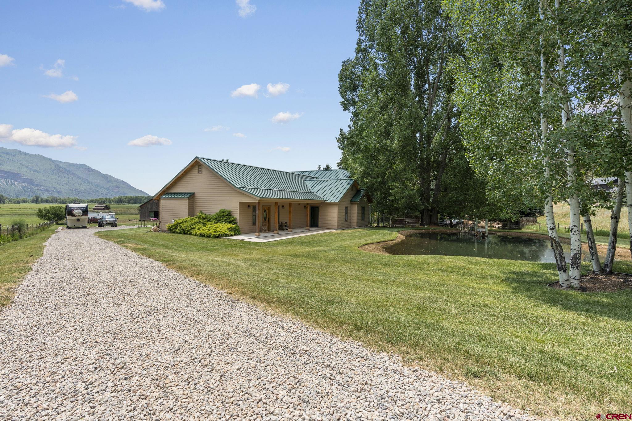 33140 Highway 550 Durango, CO 81301 - Photo 29 of 38 a front view of a house with garden