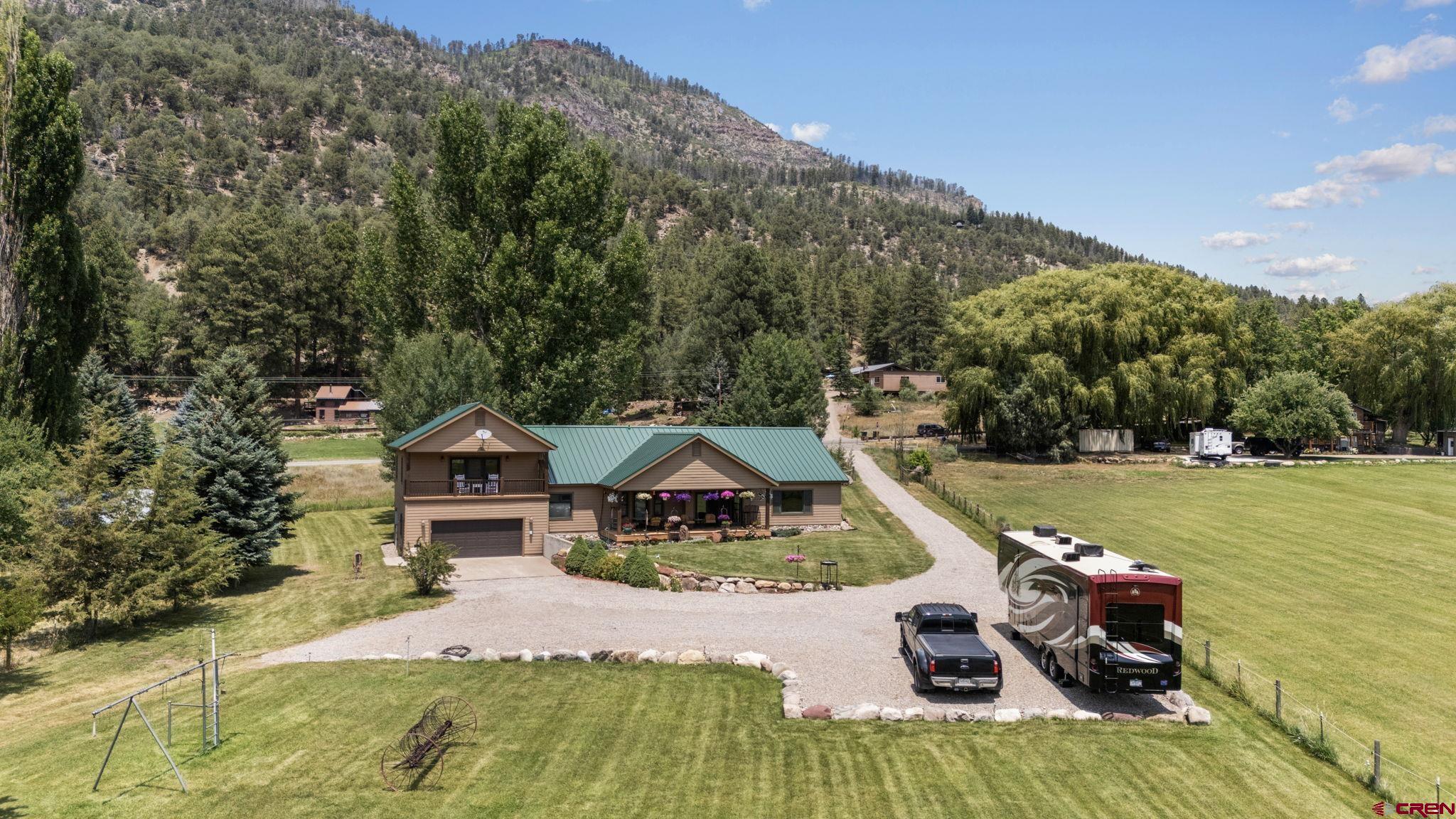 33140 Highway 550 Durango, CO 81301 - Photo 32 of 38 a view of a lake with a mountain