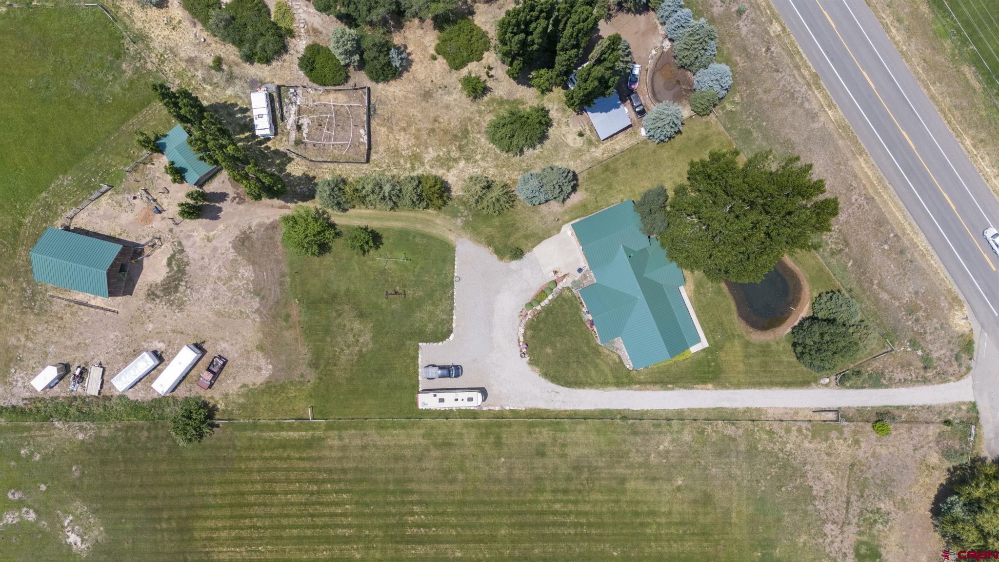 33140 Highway 550 Durango, CO 81301 - Photo 35 of 38 an aerial view of a house with a yard