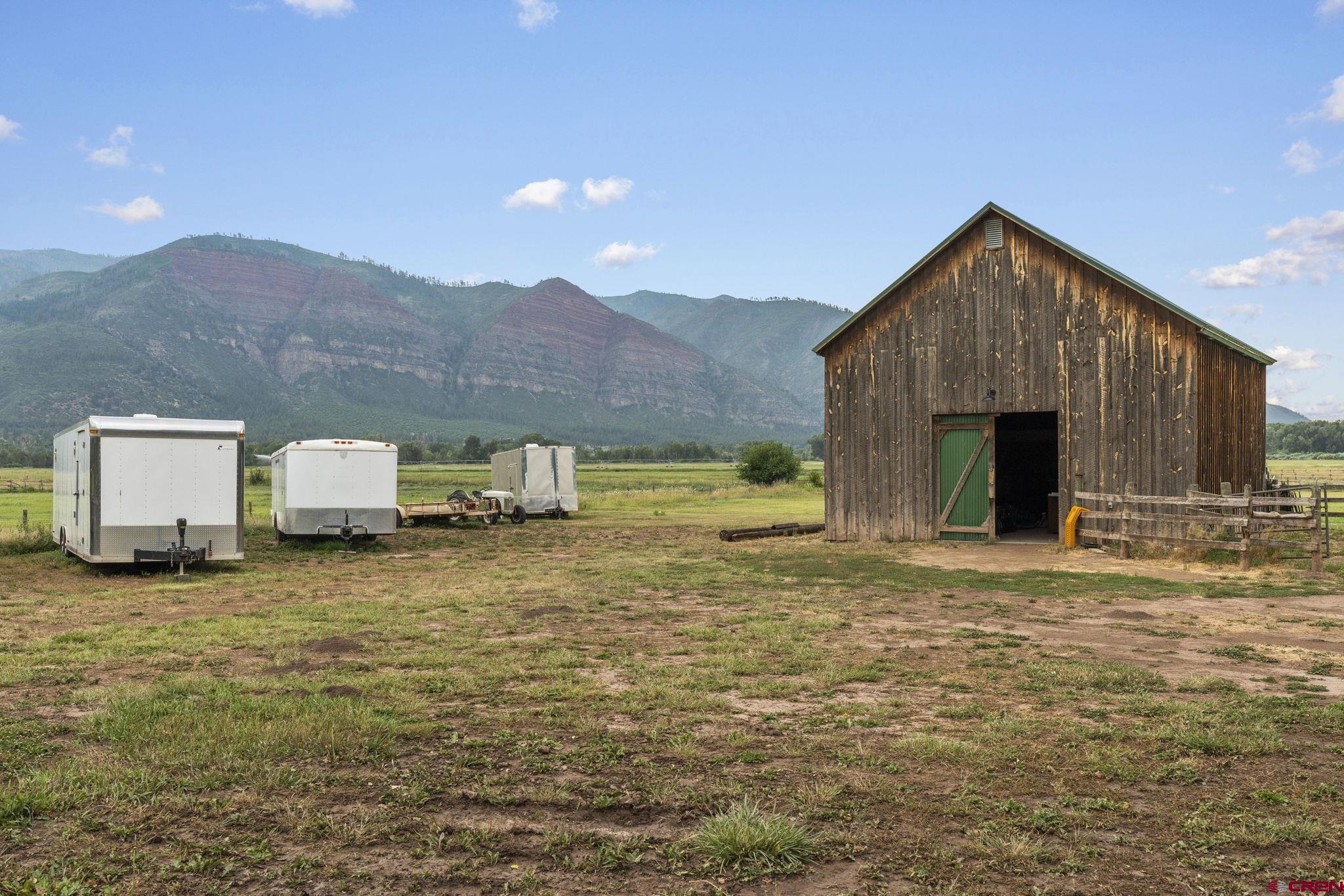 33140 Highway 550 Durango, CO 81301 - Photo 36 of 38 a backyard of a house with table and chairs