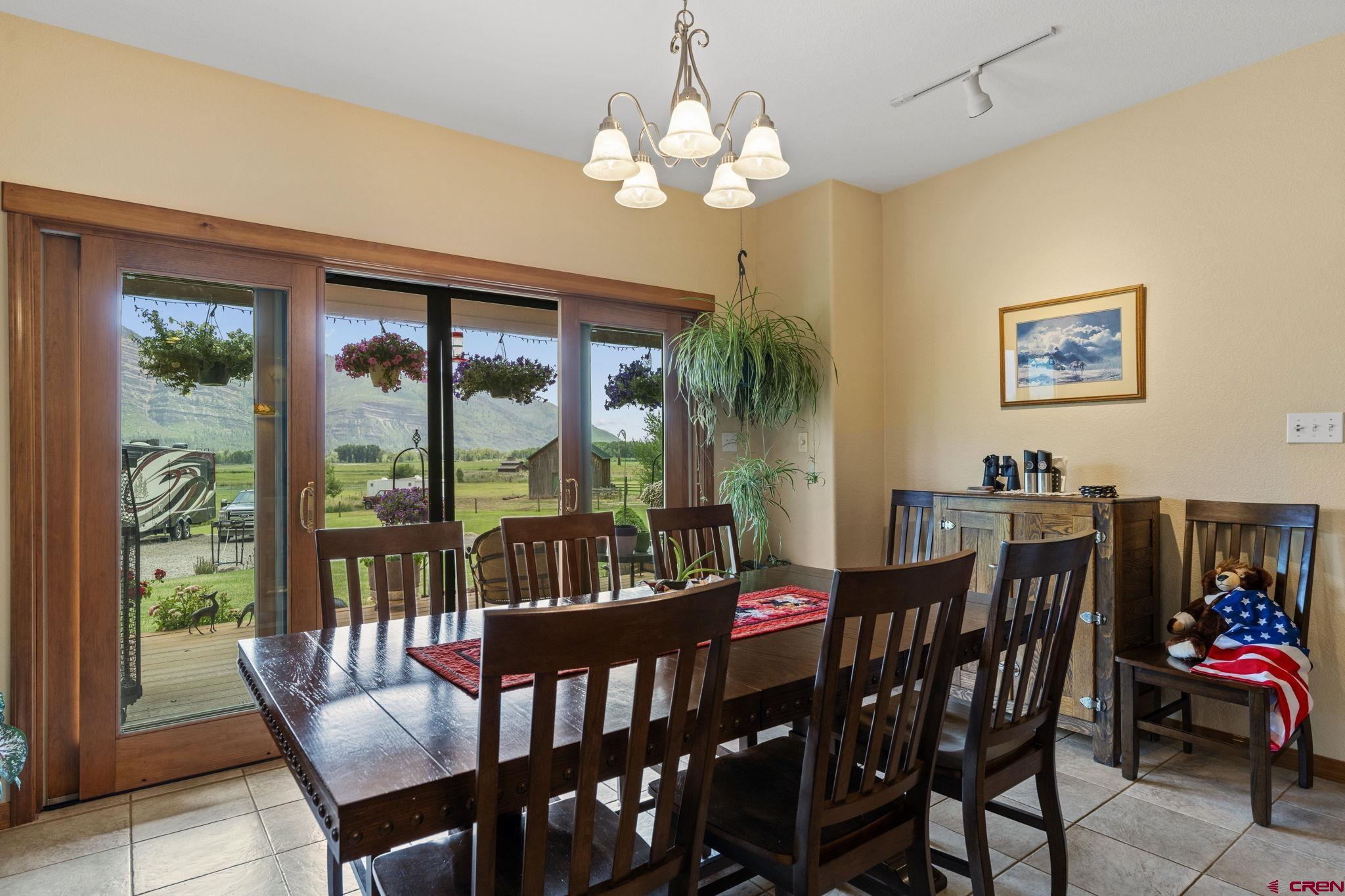 33140 Highway 550 Durango, CO 81301 - Photo 6 of 38 a view of a dining room with furniture window and outside view