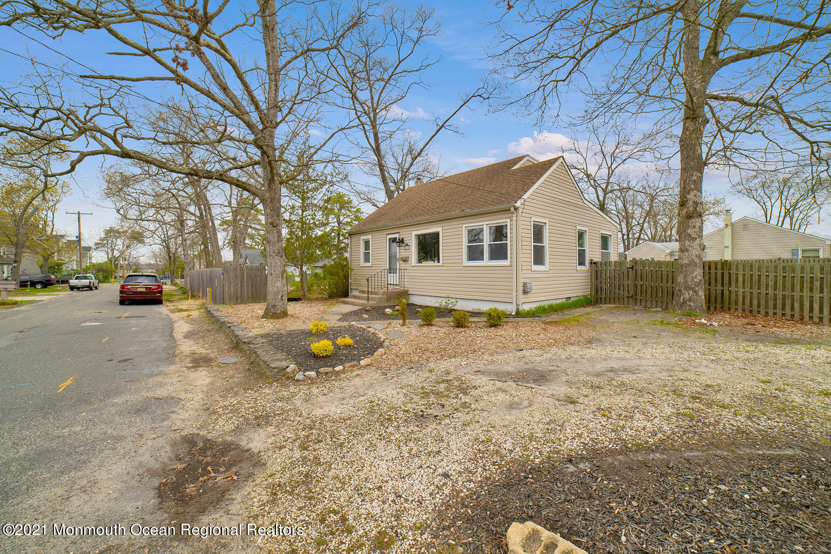 23 Stuyvesant Road Brick, NJ 08723 - Photo 2 of 18 a view of a house with a yard covered in snow