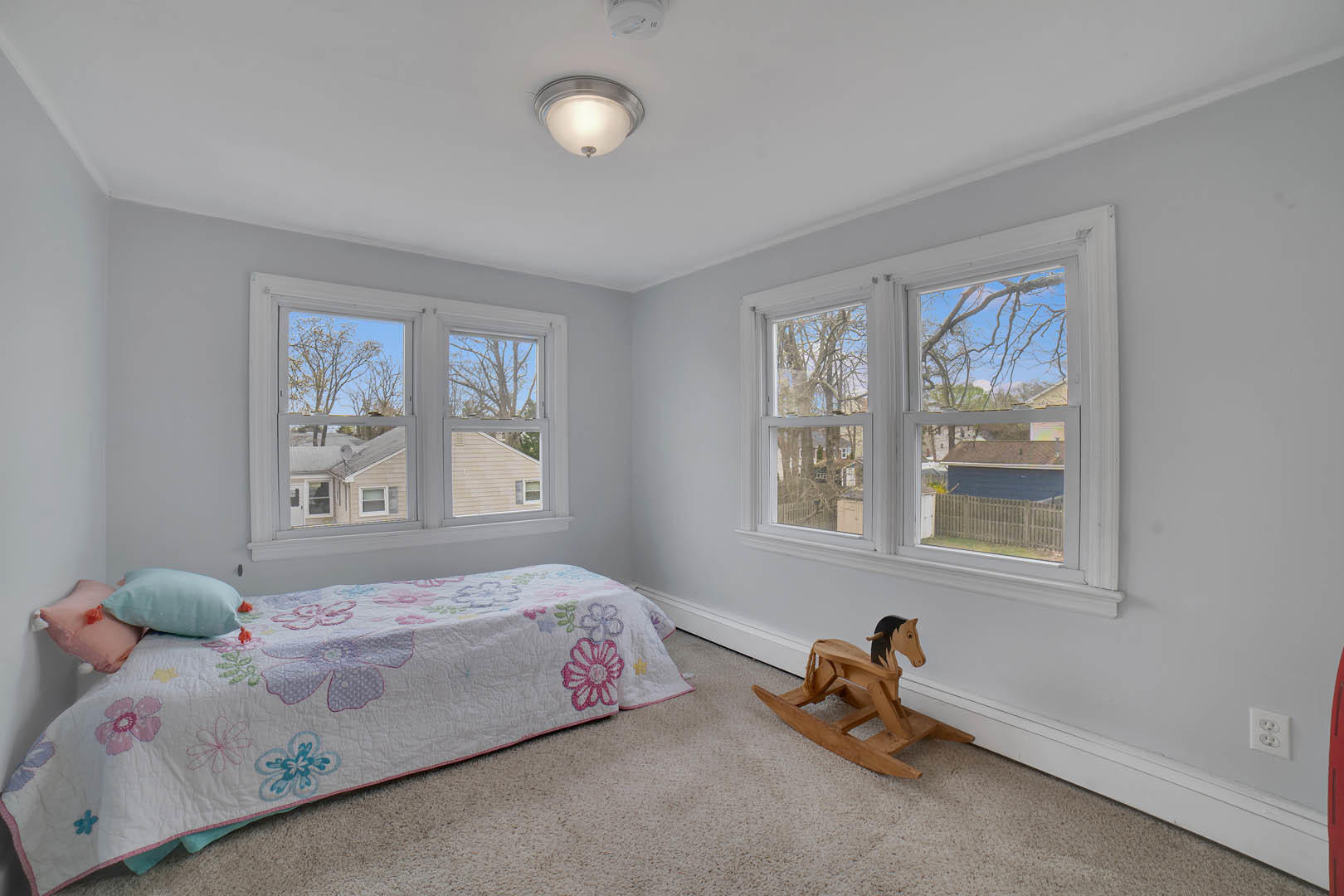 23 Stuyvesant Road Brick, NJ 08723 - Photo 12 of 18 a bedroom with a bed and a window