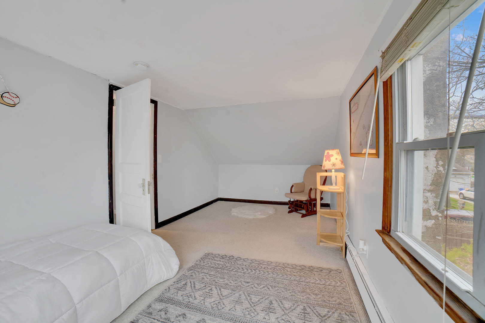 23 Stuyvesant Road Brick, NJ 08723 - Photo 15 of 18 a bedroom with a bed and a large window
