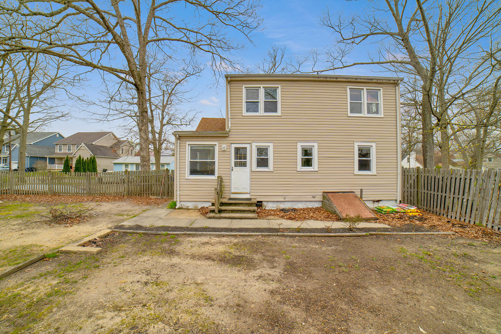 23 Stuyvesant Road Brick, NJ 08723 - Photo 17 of 18 a house with trees in front of it