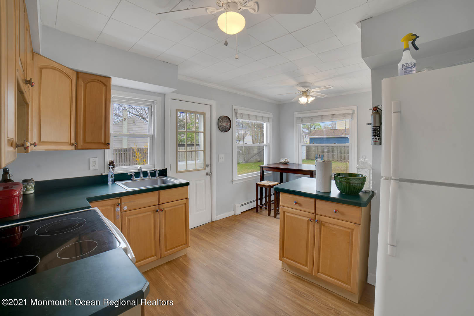 23 Stuyvesant Road Brick, NJ 08723 - Photo 8 of 18 a kitchen with a sink appliances and cabinets