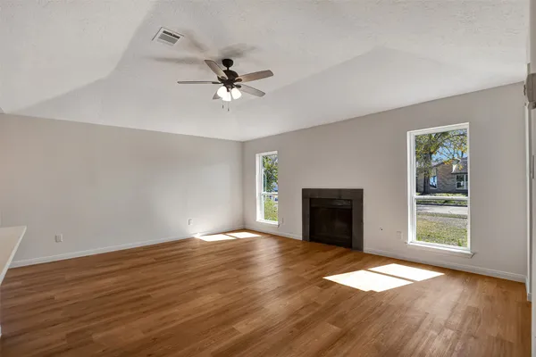a kitchen with a sink and a microwave
