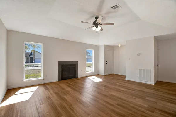 a kitchen with stainless steel appliances granite countertop a sink stove oven and refrigerator