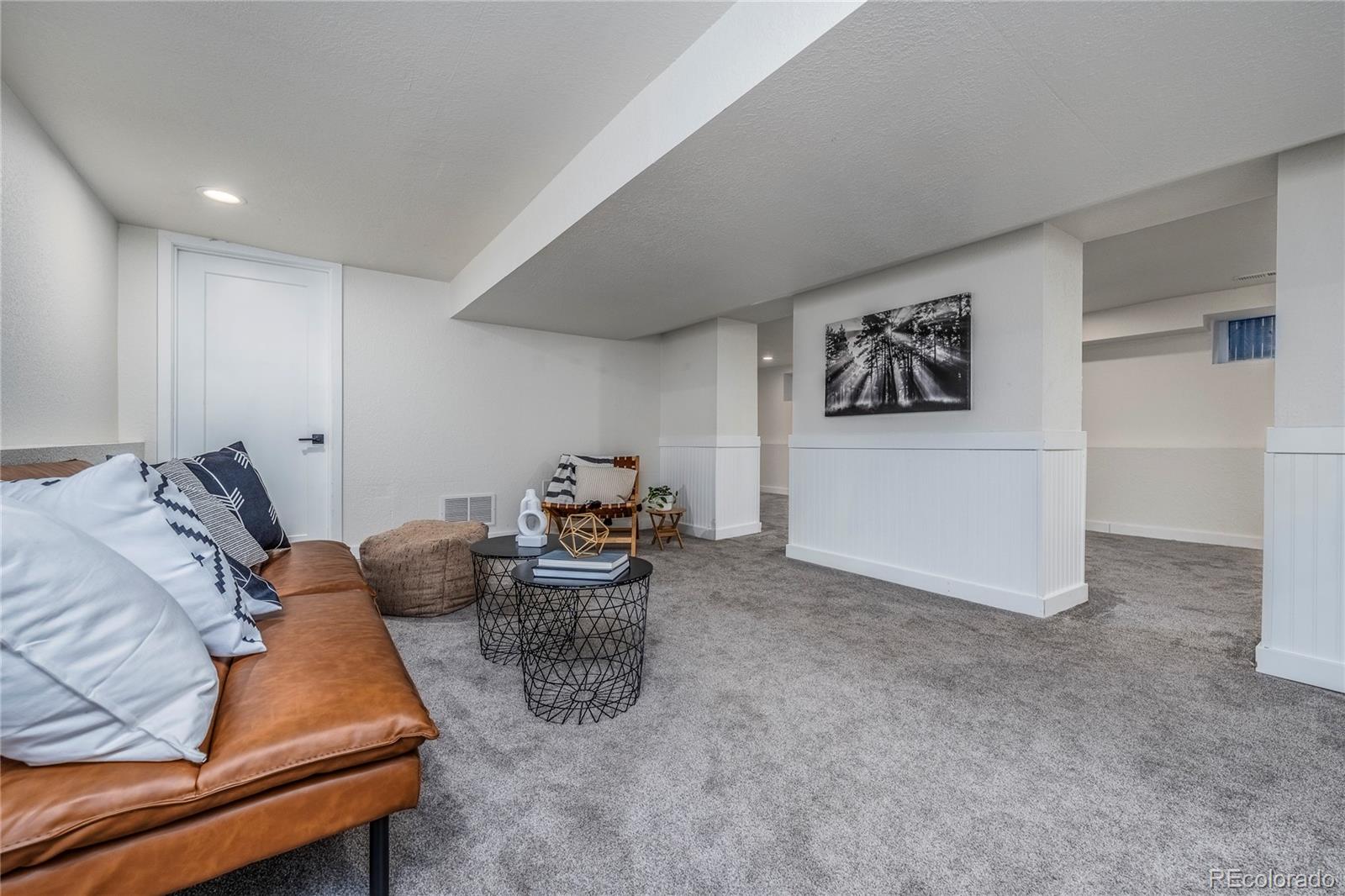 1367 Monroe Street Denver, CO 80206 - Photo 31 of 48 a room with furniture