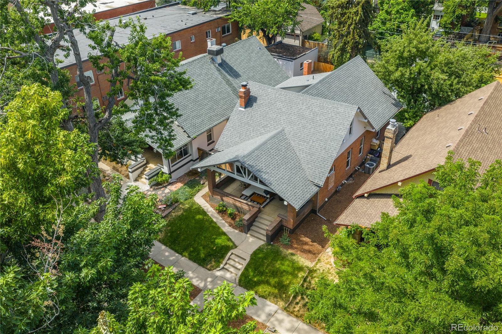 1367 Monroe Street Denver, CO 80206 - Photo 42 of 48 an aerial view of a house with a yard