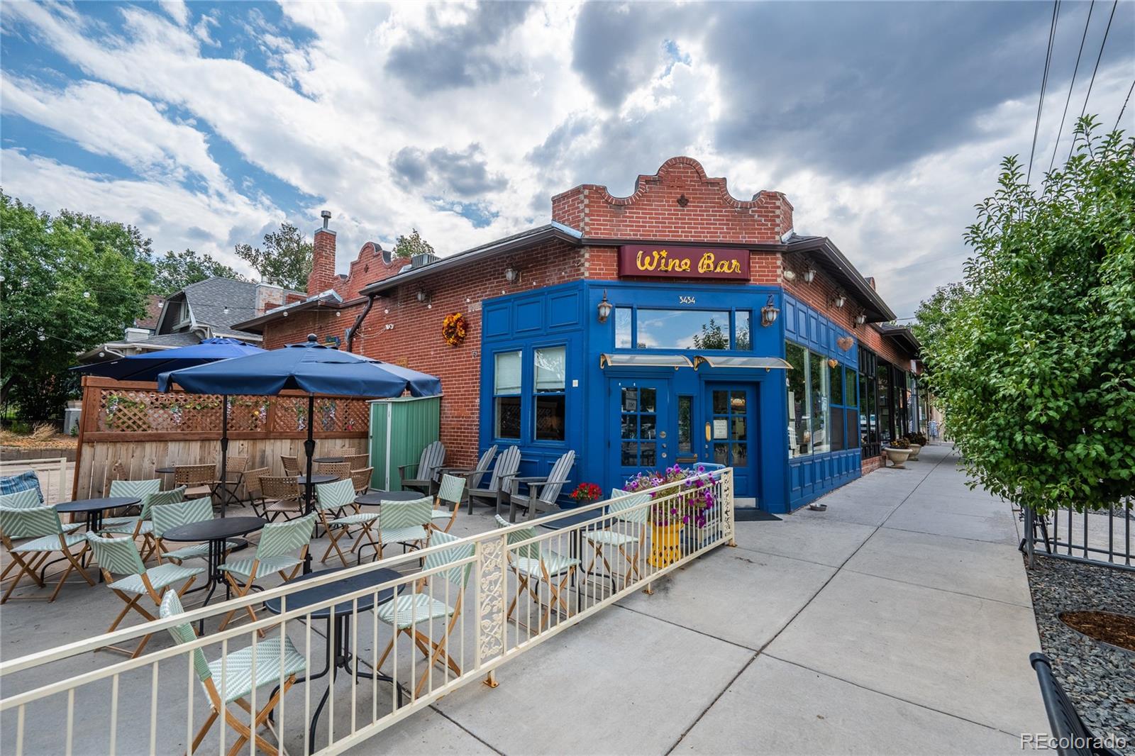 1367 Monroe Street Denver, CO 80206 - Photo 45 of 48 a view of a cafe with sitting area