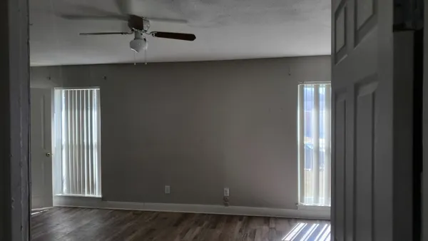 a view of a livingroom with a hardwood floor