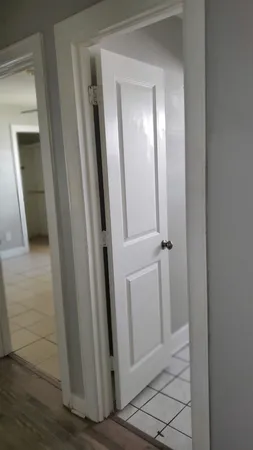 an entrance view of a mirror