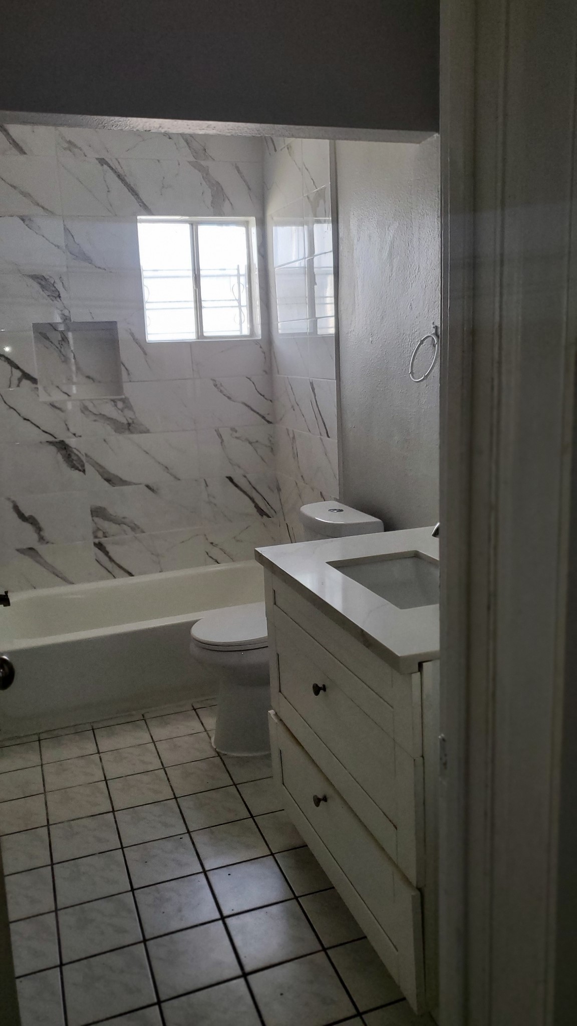 15414 West Hampton Circle Houston, TX 77071 - Photo 24 of 30 a bathroom with a granite countertop sink a toilet and shower