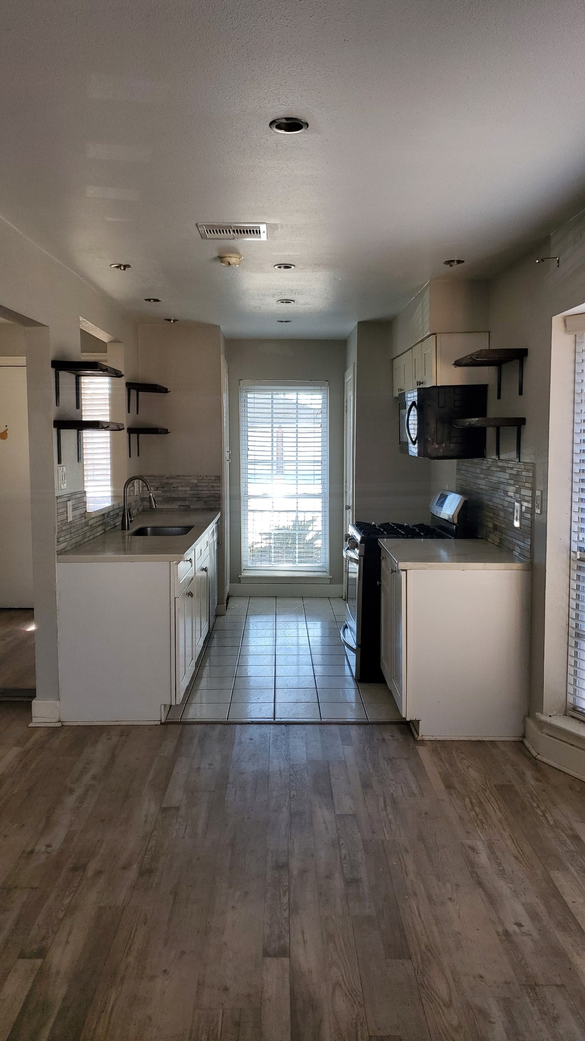 15414 West Hampton Circle Houston, TX 77071 - Photo 10 of 30 a view of a kitchen with a sink
