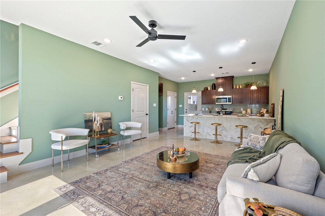 102 33rd Street West Bryan, TX 77803 - Photo 8 of 22 a living room with furniture and kitchen view