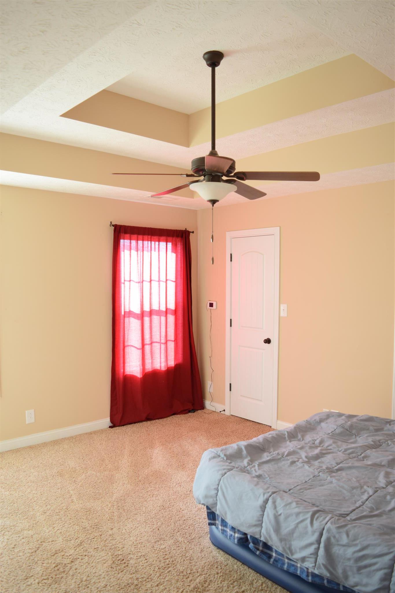 1494 Raven Road Clarksville, TN 37042 - Photo 13 of 25 a bedroom with a bed and window