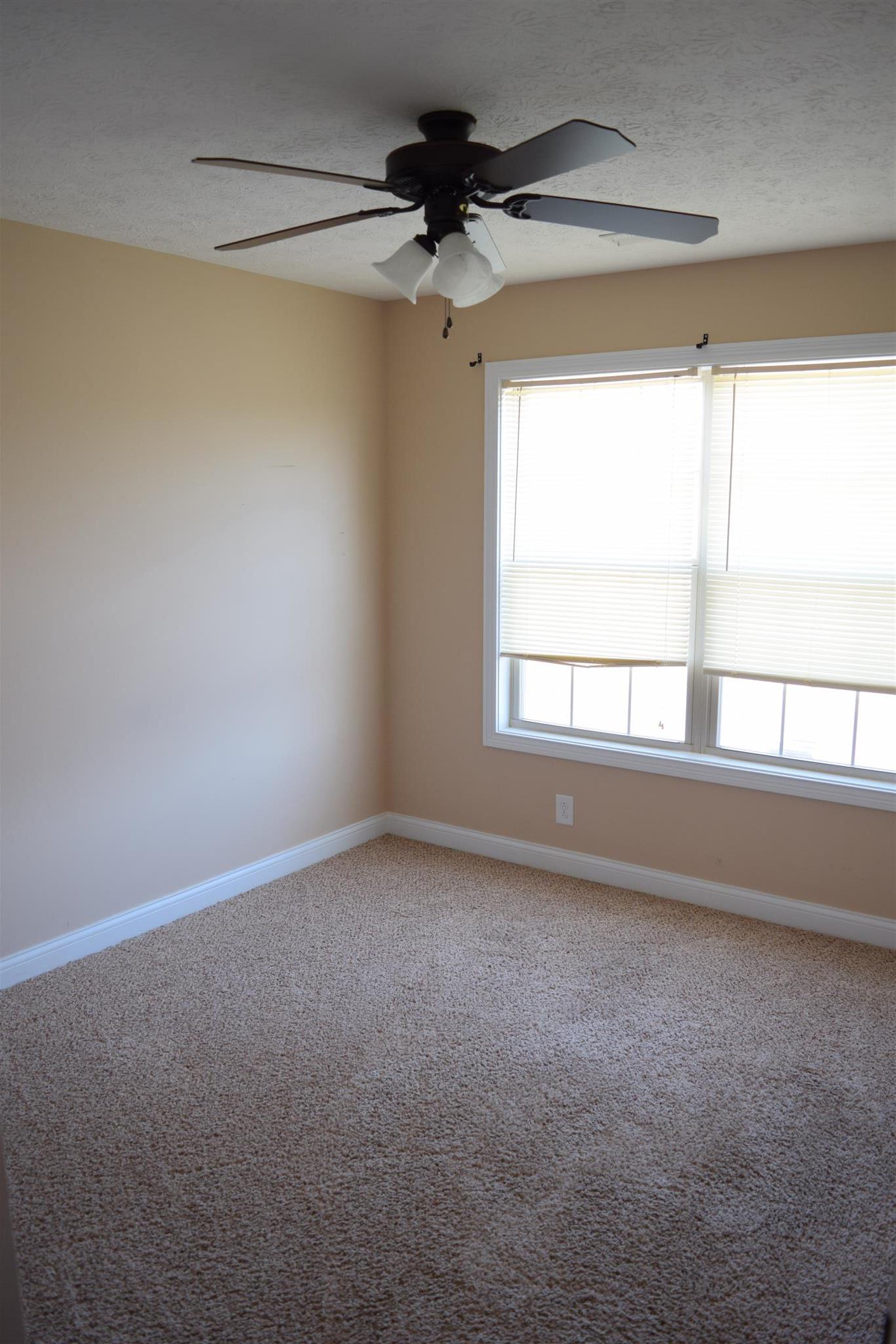 1494 Raven Road Clarksville, TN 37042 - Photo 20 of 25 a view of an empty room with a window