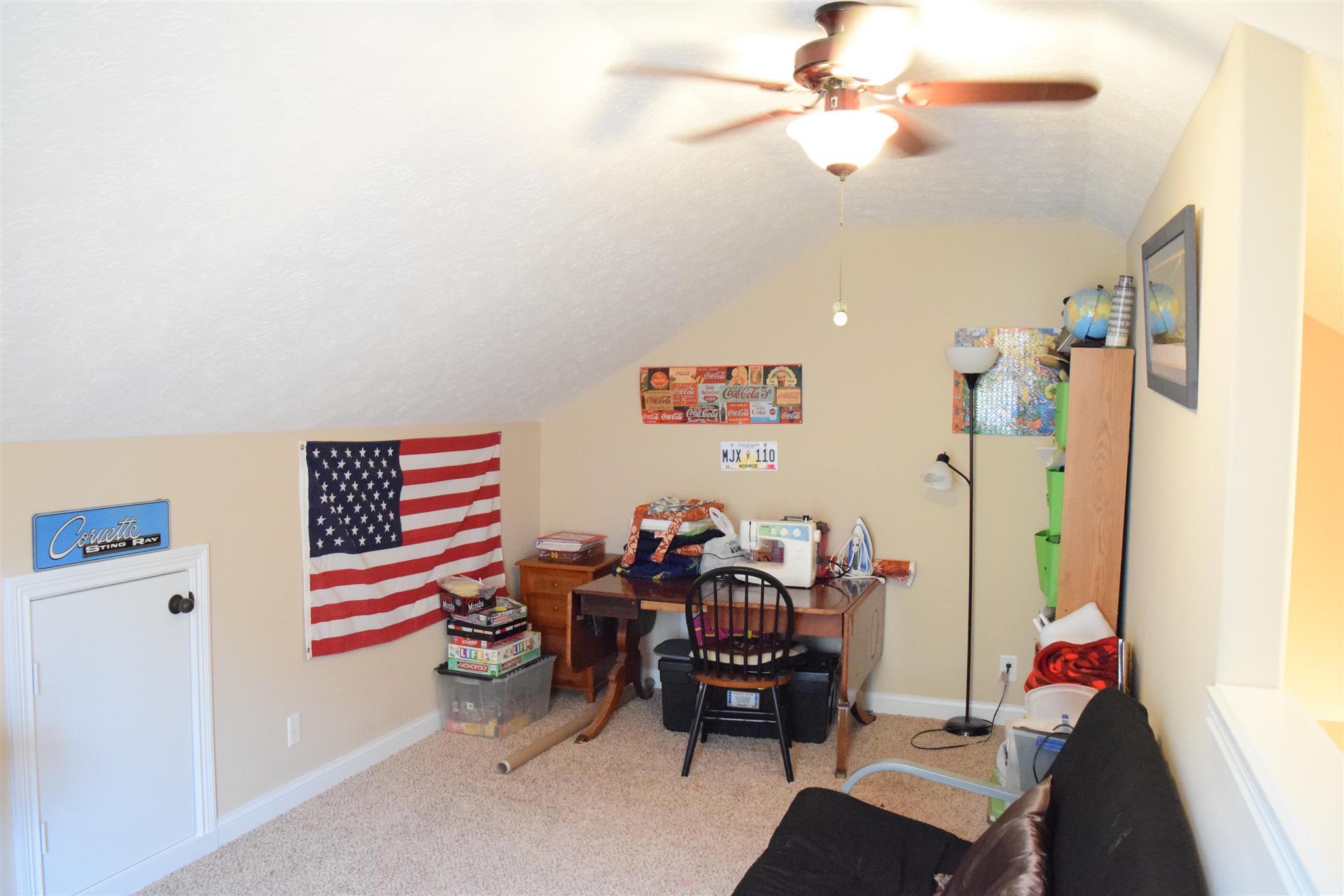 1494 Raven Road Clarksville, TN 37042 - Photo 21 of 25 a reading room with wooden floor and furniture