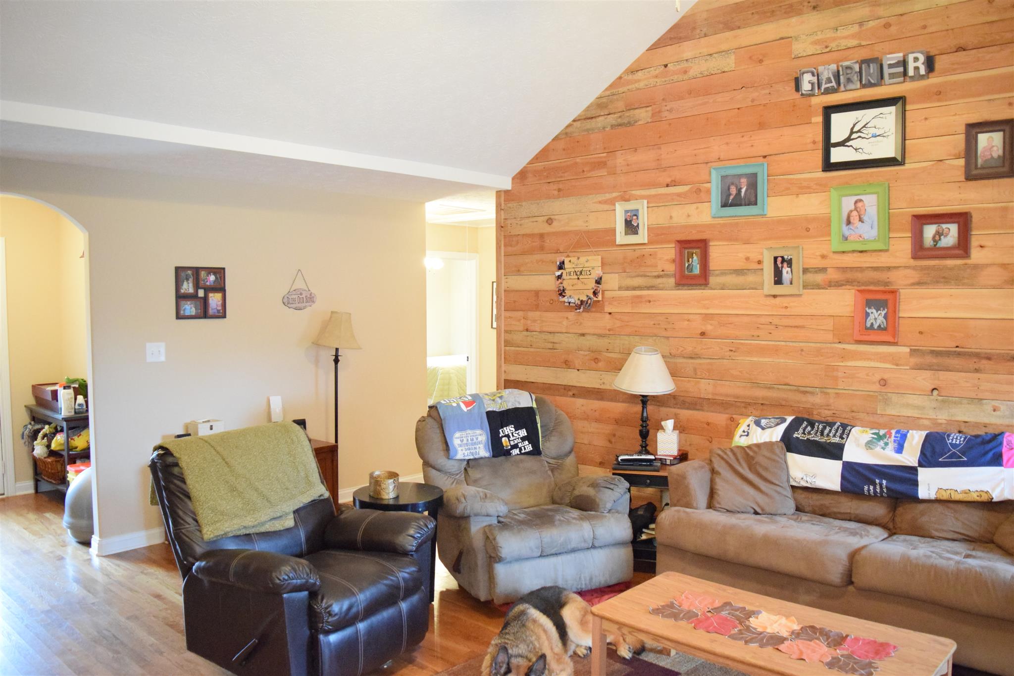 1494 Raven Road Clarksville, TN 37042 - Photo 6 of 25 a living room with furniture and a floor to ceiling window
