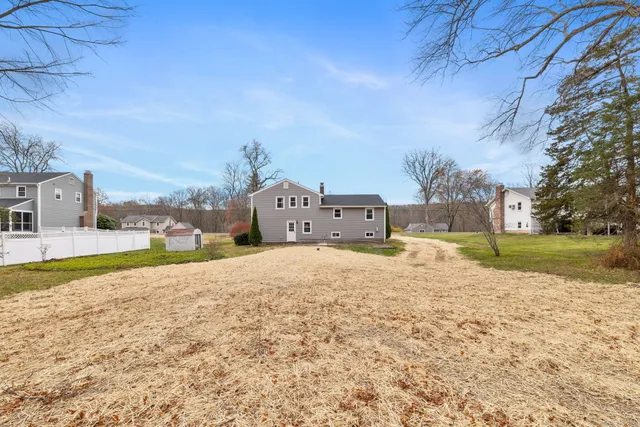 a street view with snow on the road