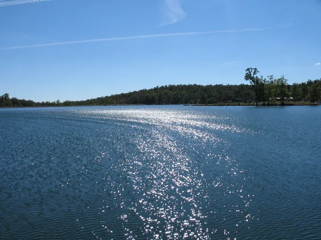 a view of a lake with a mountain in the background