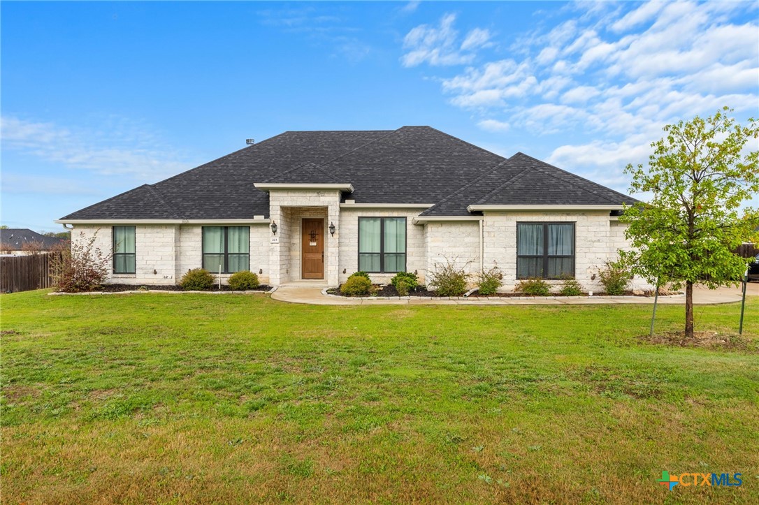 223 Sand Flat Lane Temple, TX 76502 - Photo 1 of 33 a front view of a house with a garden