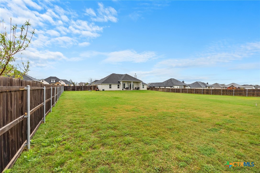 223 Sand Flat Lane Temple, TX 76502 - Photo 26 of 33 a view of a lake with a garden