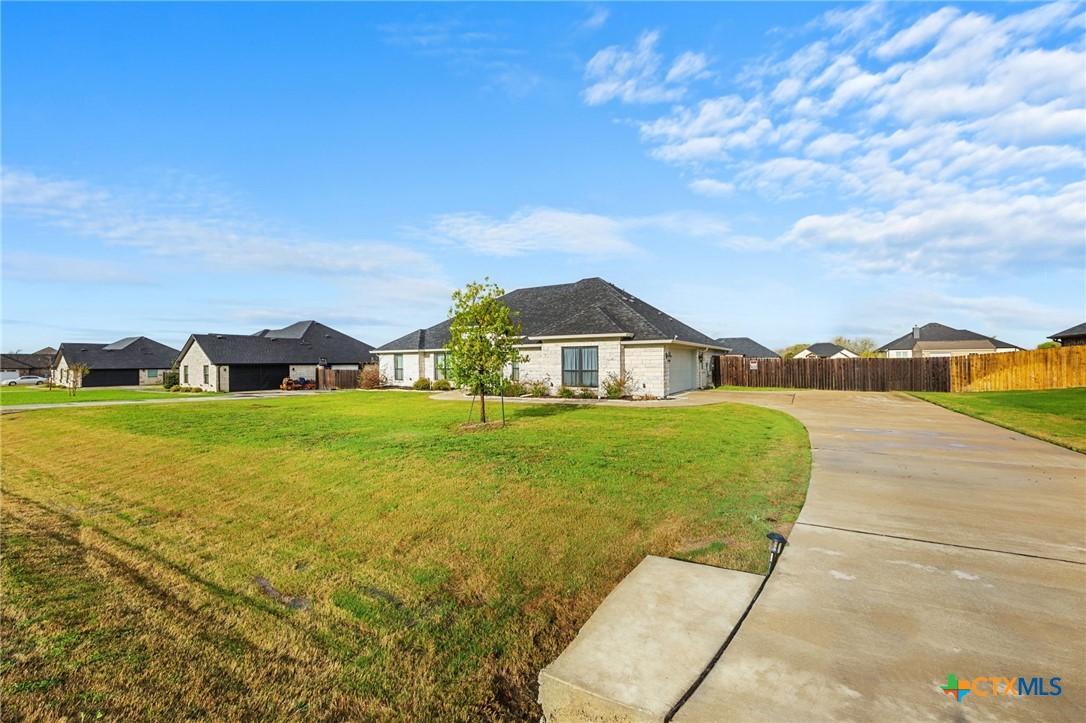 223 Sand Flat Lane Temple, TX 76502 - Photo 3 of 33 a front view of a house with yard
